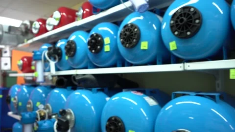 Hydroaccumulators in the store. water supply in the house Stock Footage