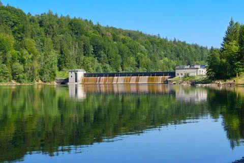 Hydroelectric Dam and Forest Reflection on Lake in Bavaria Germany Photos