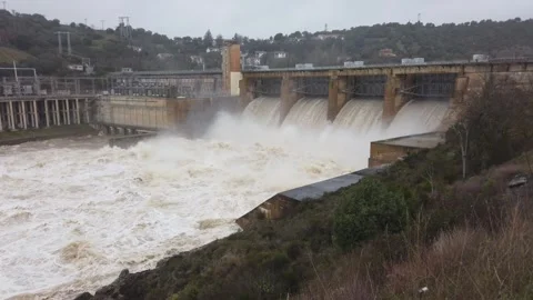 Hydroelectric Dam Generating Massive Energy After Heavy Rainfall Stock Footage 329110315