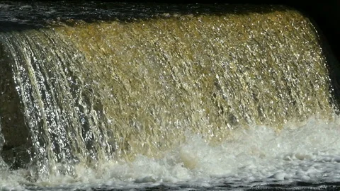 At a hydroelectric dam waterfall Stock Footage 119757507