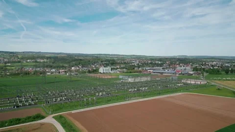 Hydroelectric power station and electric substation with high voltage cables Stock Footage 272461553