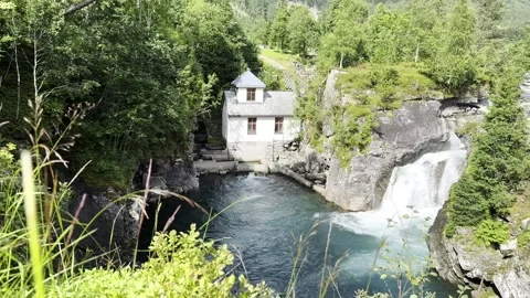 Hydroelectric power station with waterfall trollst 库存影片 340238143
