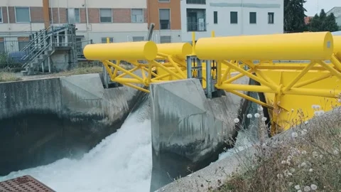 Hydroelectric small power station on the river in Piedmont, Italy. Small dam Stock Footage 264166254