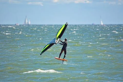 Hydrofoil surfboard surfer. Stockfoto's