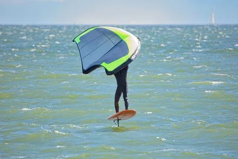 Hydrofoil surfboard surfer. Stockfoto's