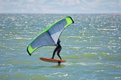 Hydrofoil surfboard surfer. Stockfoto's