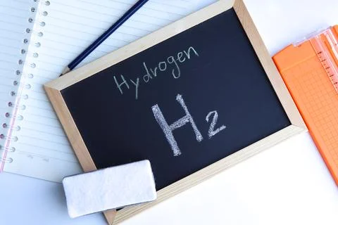 Hydrogen and symbol structural formula chemical write on the blackboard Stock Photos