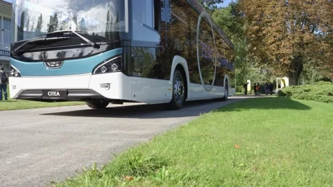 Hydrogen bus driving by Stock Footage 220010361