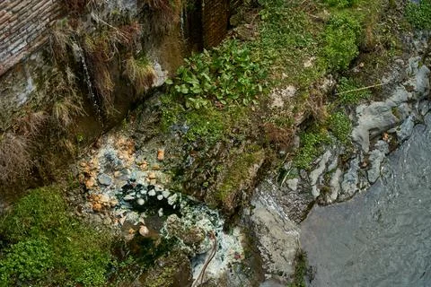 Hydrogen sulfide source flows from the rock Stock Photos