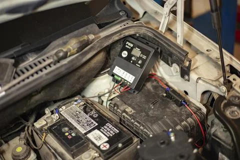 Hydrogen system control unit in the car engine Stock Photos
