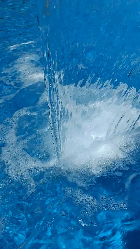 Hydromassage waterfall close up. Flow of clean transparent water in the pool Stock-Footage 329937144