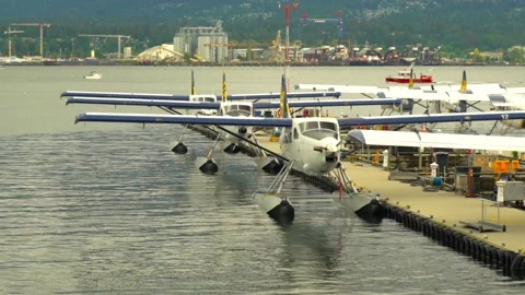 Hydroplanes In The Dock With Boats Sailing In Background Stock Footage 196846308