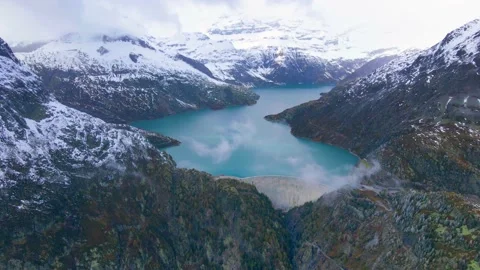 Hydropower generated from arch dam and reservoir lake Stock Footage 141153662