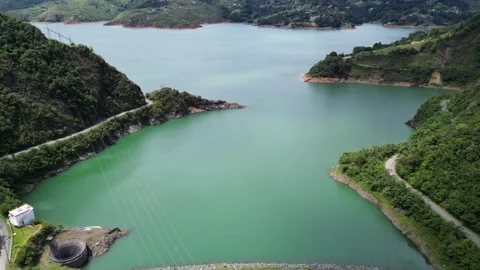 Hydropower Plant and Water Storage from Above Stock Footage 310407853