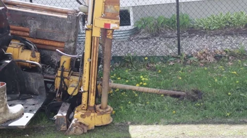 Hydrovac Machine Driving Drill Rod for Streetlight Pole Installation, drill bit Stock Footage 345453633