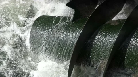 Hydrowater turbine screw making clean energy electricity with hydroelectric Stock Footage