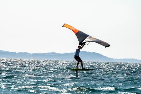 Hyeres, Almanarre beach, France, July 10, 2021. Extreem water sport - wing fo Stock Photos