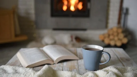 Hygge concept with open book Video stock 104814074