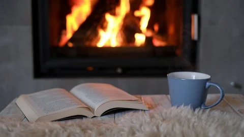 Hygge concept with open book Stock Footage 104814288
