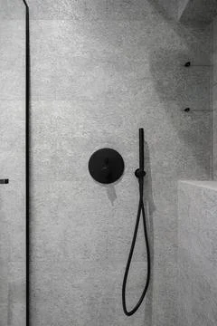 Hygienic shower in the bathroom close-up Stock Photos