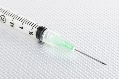 Hygienic Single-Use Disposable Injection On Metal Background Stock Photos