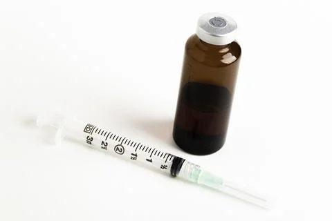 Hygienic Single-Use Plastic Disposable Injection And Amber Color Vial Stock Photos