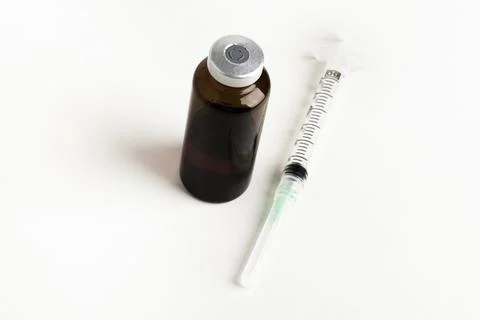 Hygienic Single-Use Plastic Disposable Injection And Amber Color Vial Stock Photos
