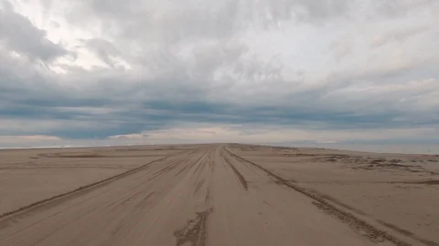 Hypelapse driving between lake and sea moody sky Stock Footage 123357664
