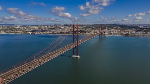 [Hyper Lapse] 25 April bridge in Lisbon, Portugal, at sunny day, 4k aerial drone Stock Footage 111687471