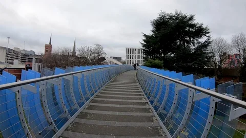 Hyper Lapse Across Millennium Glass Bridge in Coventry 動画素材 100676810