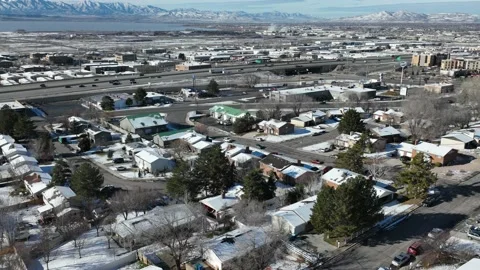 Hyper lapse from aerial view of busy freeway entrance Stock Footage 167921060