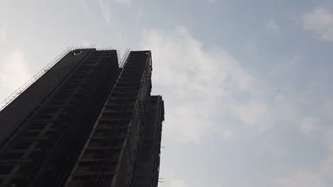 This is a hyper-lapse of a building under construction. Stock Footage 124131288