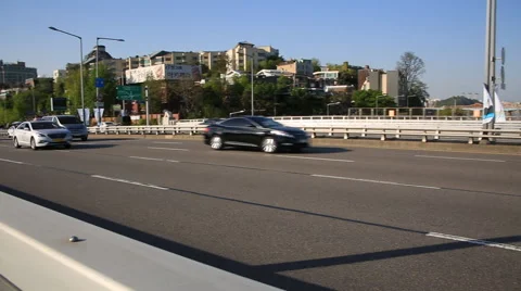 Hyper lapse of city traffic on big bridge by Han river at sunset Video stock 62586947