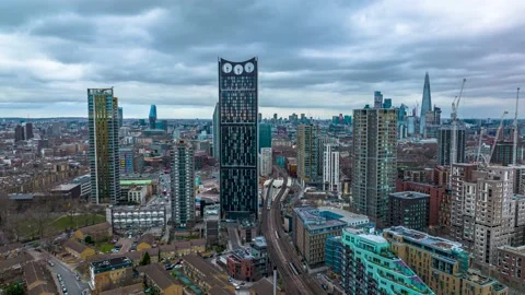 Hyper lapse of cityscape Tall contemporary apartment towers against cloudy sky Stock Footage 171931059