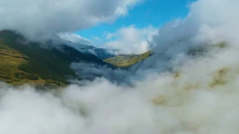 Hyper lapse of clouds moving in green mountain valley, time lapse of weather 스톡 동영상 159609050