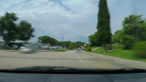 Hyper lapse dashboard camera view of car driving in seaside town Portoroz Stock Footage 156374403