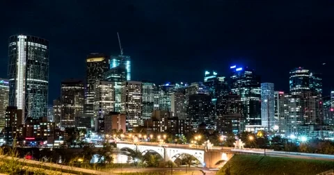 Hyper lapse of downtown Calgary and Centre Street Bridge at night Stock Footage
