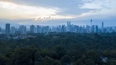 Hyper lapse dronelapse aerial view of sunrise at Kuala Lumpur city skyline. Stock Footage 95757892