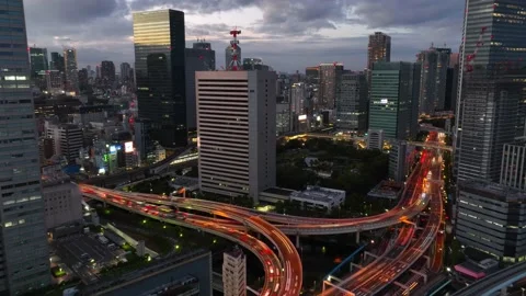 Hyper lapse of evening highway with busy traffic in Tokyo, Japan, aerial Stock Footage 219257903