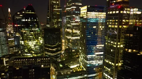 Hyper lapse footage of modern high rise buildings in City business hub at night Video stock 201908721