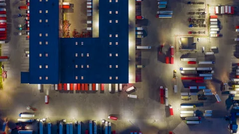 Hyper lapse (hyperlapse - motion time lapse) of a logistics park with semitrucks Stock Footage 157694562