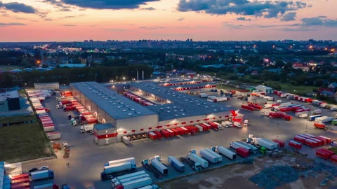 Hyper lapse (hyperlapse - motion time lapse) of a logistics park with semitrucks Stock Footage 157784313