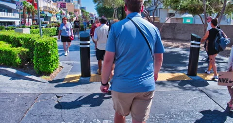 Hyper Lapse of Man Walking the Strip in Las Vegas NV Day 4k Stock Footage 198884450