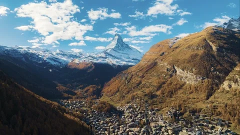 Hyper lapse or drone time lapse aerial view of Zermatt village in Switzerland. 動画素材 252561556