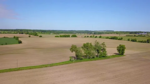 Hyper-lapse over farm fields on a sunny, summer day Stock Footage 132592515