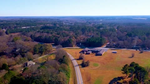 Hyper lapse pull away down a fall grass road with traffic green trees. Stock Footage 170572001