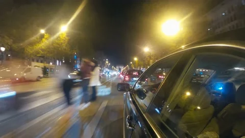 Hyper-lapse side view from the car window to the road driving at night in Paris 스톡 동영상 171023425