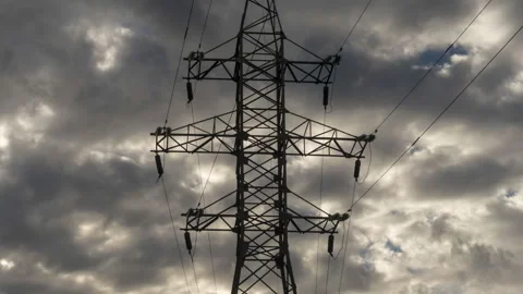 Hyper lapse video of fast moving clouds and the power line column Stock Footage 95656806