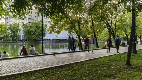 Hyper lapse video of people strolling on a summer day along the Boulevard Stock Footage 114063332