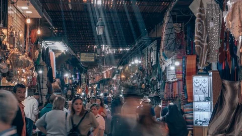 Hyper lapse walking through a crowded indoor market place in Marrakesh Stock Footage 107377771